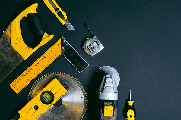 Yellow and Black Hand Tools on a Table - Photo by Anna Shvets: https://www.pexels.com/photo/yellow-and-black-hand-tools-on-the-table-4312858/