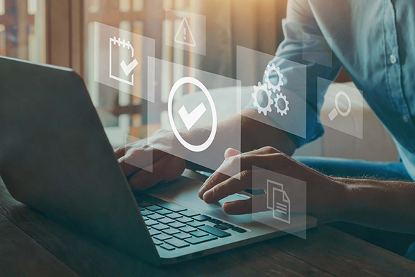 Hands typing on laptop - iStock-1282633951.jpg