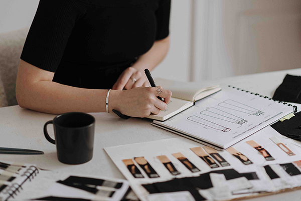 Faceless woman drawing sketches in studio - Photo by Anete Lusina: https://www.pexels.com/photo/faceless-woman-drawing-sketches-in-studio-7256897/